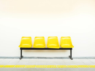 waiting chair yellow plastic