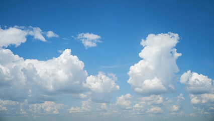 The fluffy white clouds against the blue sky created a classic and timeless view of nature.