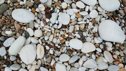 Beauty marble pebbles on the beach
