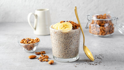 Chia Pudding with Banana, Granola and Cinnamon, Overnight Banana Oats, Healthy Breakfast or Snack, Vegetarian Food
