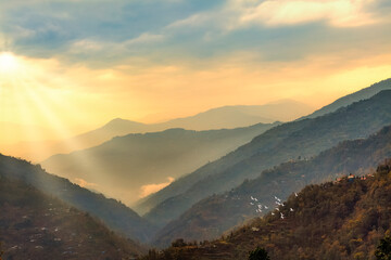 Himalayan landscape with scenic mountain range and valley at sunrise at the hill station of...