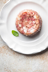 meat brawn food Sülze piece of meat in jelly pork, beef meat ready to eat meal food snack on the table copy space food background rustic top view