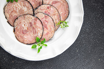 sausage pork offal meat pork stomach, pork neck, offal meal food Andouille snack on the table copy space food background rustic top view