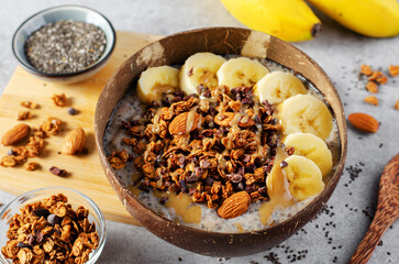 Chia Pudding Bowl with Banana, Granola and Cinnamon, Healthy Breakfast, Vegetarian Food
