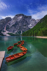 boats on Lake Braies in the mountains - 646117817