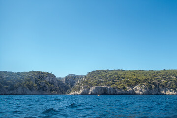 Kayaking to the Calanques fjords on the Mediterranean sea near Cassis in summer