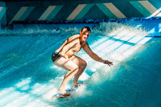 Man on flowboard on blue background