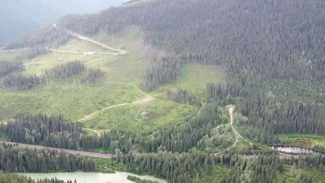 Landscape Valley and Lake Bird's-Eye View - Beautiful British Columbia. Left, reverse and down motions. Lake Kinbasket BC Canada.