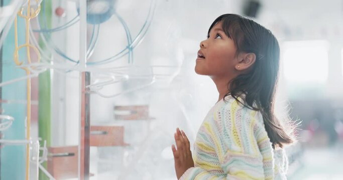 Education, learning and explore with child at science fair for research, idea and knowledge. Creative, engineering and development with student on school field trip for study, project and technology