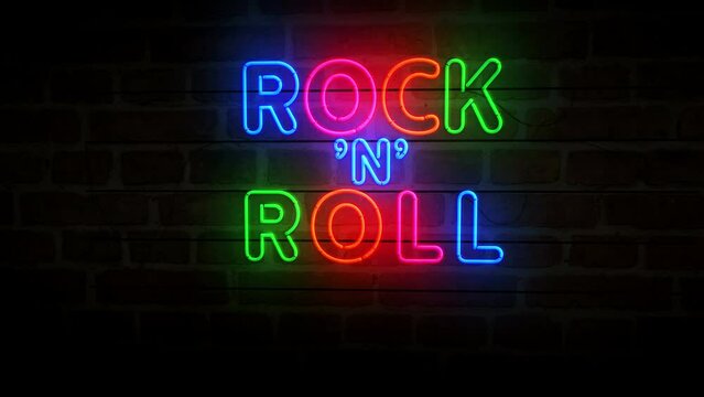 Rock-n-roll neon on brick wall. Rock n Roll music club retro style  light color bulbs. Abstract concept 3d animation.