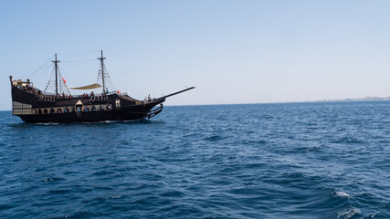 Pirate ship on the mediterranean ocean, open water.