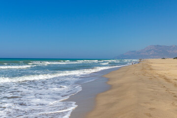 Antalya Patara beach, sea, sand and mountain view.