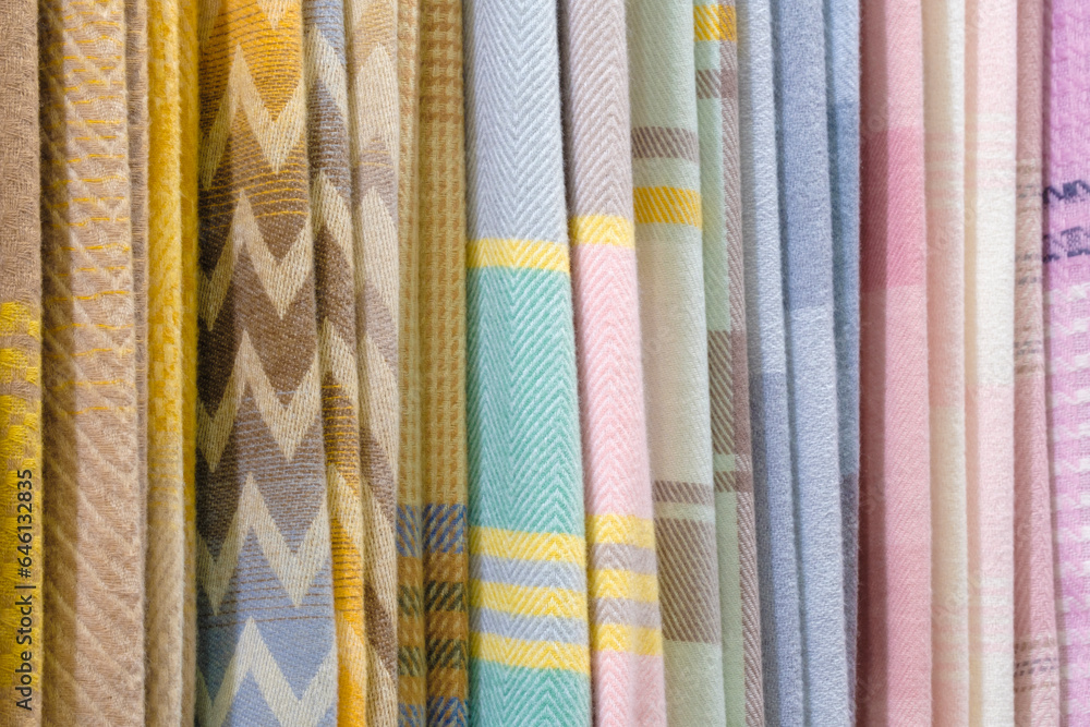 Aufkleber mix colorful hanging vertical stripe textile, fabrics, cloths on the rack. texture of multicolored f