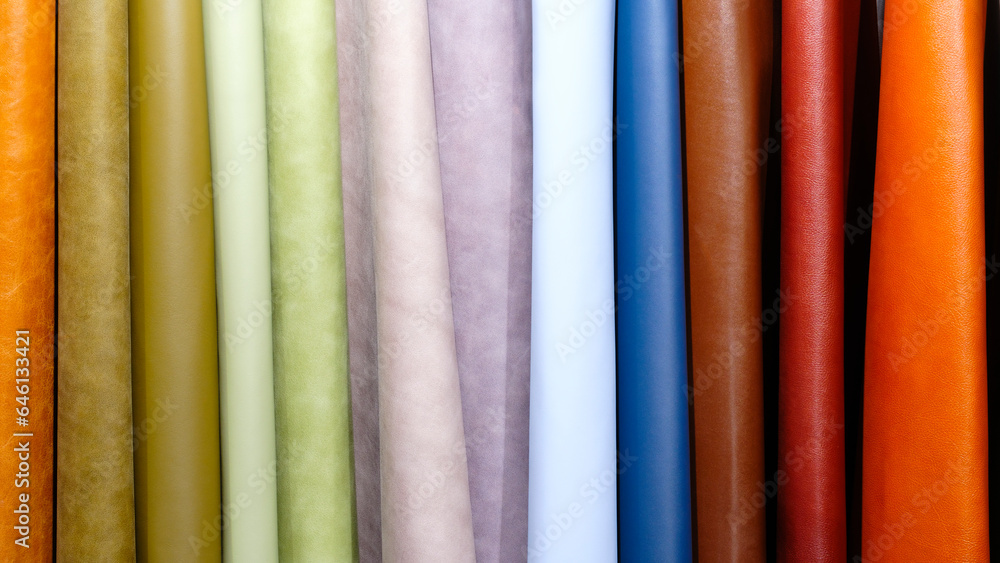 Aufkleber mix colorful hanging vertical stripe leather on the rack. texture of multicolored leather close up.
