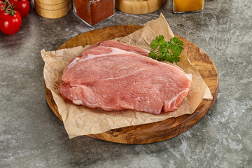 Raw pork schnitzel for cooking