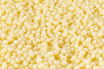 Crisped puffed rice cereal as background texture. close-up
