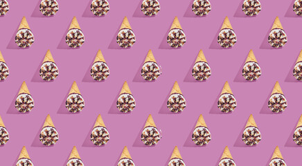 Pattern of hazelnut ice cream on a stick on purple pastel background