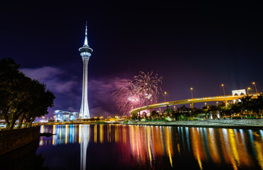 Fototapeta na wymiar Night view of the Macau Tower with New Year fireworks