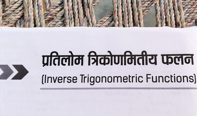 chapter name "inverse trigonometric functions"  of Indian mathematics intermediate book written in Hindi and English