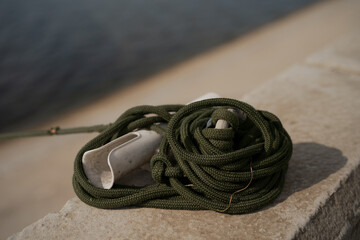 Mooring ship rope in knot with tension