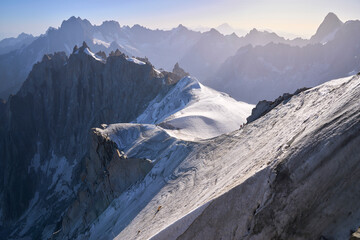 The steep and extremely exposed ice ridge to descend to the glacier below the Aiguille du Midi...