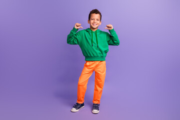 Fototapeta na wymiar Photo of positive cheerful guy wear trendy green hoodie two arms indicating himself isolated on purple color background