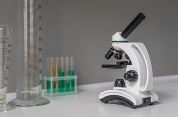 research laboratory, microscope and test tubes,