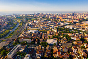 Obraz premium Roofs of town Barcelona and district Sant Adria de Besos, Besos river. Spain