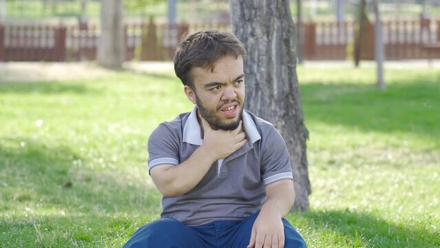 Dwarf young man with panic attack problem.
