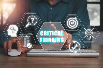 Critical thinking concept, Businessman working on computer with critical thinking icon on virtual...