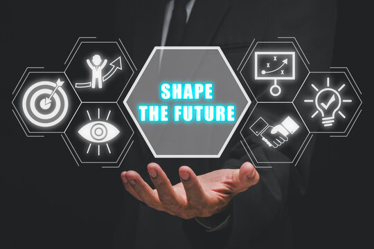 Shape the future concept, Businessman hand holding shape the future icon on virtual screen.