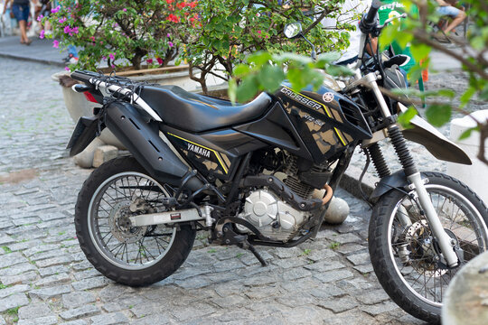  A Yamaha Crosser xtz 150 motorcycle stops on a street in Pelourinho, the historic center of the city of Salvador, Bahia.