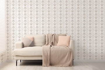Minimalist living room interior with comfortable beige sofa