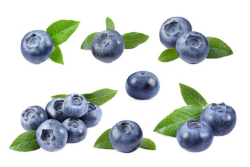 Set with fresh ripe blueberries and green leaves isolated in white