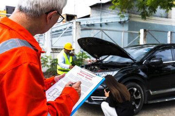 Car insurance man writing damages on claiming clipboard with mechanic fixing vehicle background