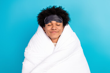 Photo portrait of attractive young man closed eyes enjoy sleeping soft cover wrapped blanket...