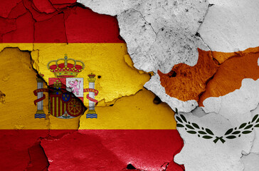 flags of Spain and Cyprus painted on cracked wall