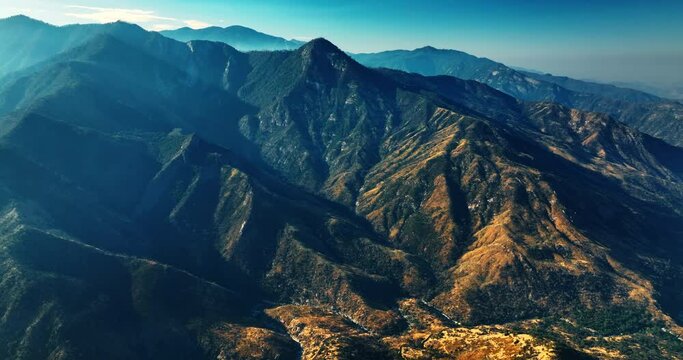Californian rocky landscape on sunny morning. Drone footage above the rocks with poor vegetation on.