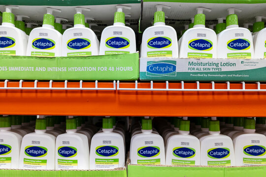 Manila, Philippines - Cetaphil moisturizing lotion dispenser bottles for sale at a local supermarket.