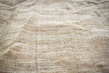 brown sackcloth texture background, crumpled burlap fabric textile for design