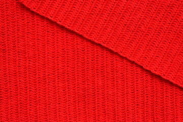 overlap of red wool knitted yarn texture, woolen fabric background