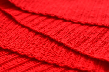 overlap of red wool knitted yarn texture, woolen fabric background