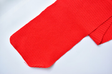 red wool knitted yarn texture, woolen fabric on white background
