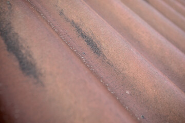 Brown roof slate sheet background. Repairs and construction works