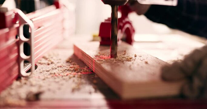 Wood, drill and tools with closeup of person in workshop for furniture, manufacturing and renovation. Production, carpenter and design with handyman in home garage for remodeling, board or contractor