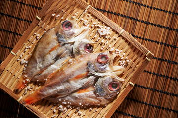 Semi-dried fish sprinkled with salt