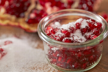 Pomegranate seeds mixed with sugar	