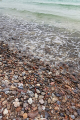 Wave of the sea on the sand beach