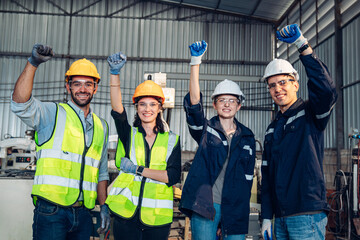 Portrait of automation engineer team standing and looking camera in industrial factory.