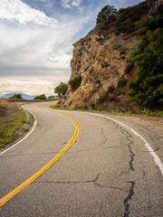 Mountain Road with dramatic clouds